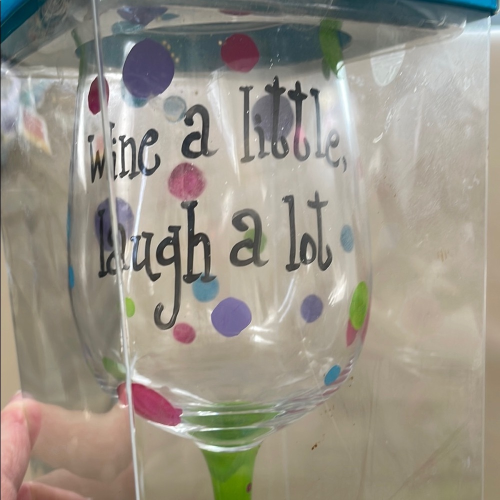 Colorful Polka Dot Wine Glass says wine a little laugh a lot
